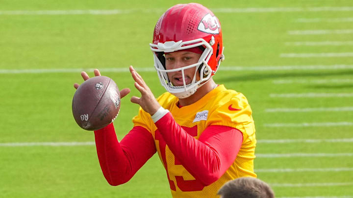 Jul 22, 2025; St. Joseph, MO, USA; Kansas City Chiefs quarterback Patrick Mahomes (15) receives a snap during training camp at Missouri Western State University. Mandatory Credit: Denny Medley-Imagn Images Jul 22, 2025; St. Joseph, MO, USA; Kansas City Chiefs quarterback Patrick Mahomes (15) receives a snap during training camp at Missouri Western State University. Mandatory Credit: Denny Medley-Imagn Images