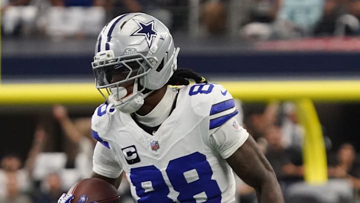 Sep 14, 2025; Arlington, Texas, USA; Dallas Cowboys wide receiver CeeDee Lamb (88) runs with the ball against the New York Giants at AT&T Stadium. Mandatory Credit: Raymond Carlin III-Imagn Images