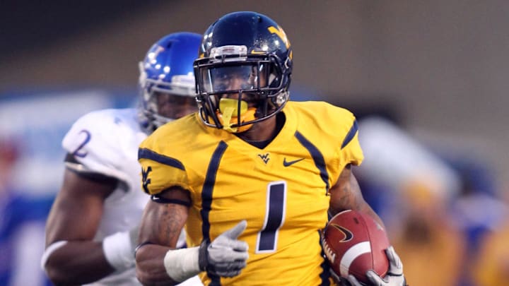 December 1, 2012; Morgantown, WV, USA; West Virginia Mountaineers wide receiver Tavon Austin (1) rushes the ball against the Kansas Jayhawks during the third quarter at Milan Puskar Stadium. The West Virginia Mountaineers won 59-10. Mandatory Credit: Charles LeClaire-Imagn Images December 1, 2012; Morgantown, WV, USA; West Virginia Mountaineers wide receiver Tavon Austin (1) rushes the ball against the Kansas Jayhawks during the third quarter at Milan Puskar Stadium. The West Virginia Mountaineers won 59-10. Mandatory Credit: Charles LeClaire-Imagn Images