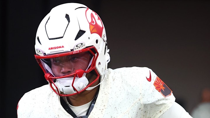 Sep 25, 2025; Glendale, Arizona, USA; Arizona Cardinals quarterback Kyler Murray (1) runs onto the field for warm ups before the game against the Seattle Seahawks at State Farm Stadium. Mandatory Credit: Mark J. Rebilas-Imagn Images