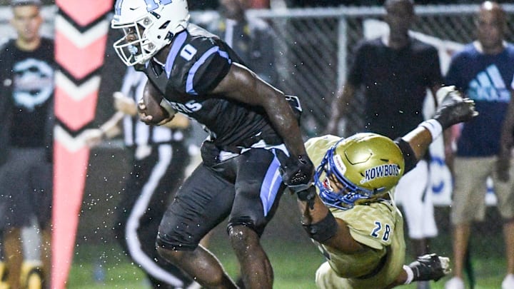 Jaylen Hayward of Rockledge shakes the tackle of Osceola tackler Elijah Melendez doing their game Friday, September 23, 2022. Craig Bailey/FLORIDA TODAY via USA TODAY NETWORK

High School Football Osceola Kowboys At Rockledge Raiders