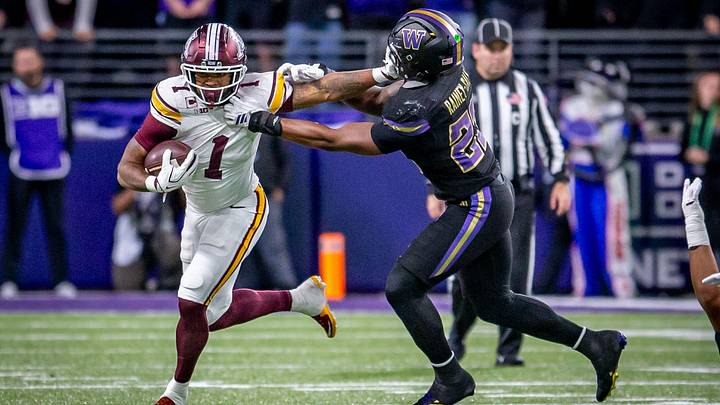 Linebacker Zaydrius Rainey-Sale tries to bring down Minnesota's Darius Taylor. 