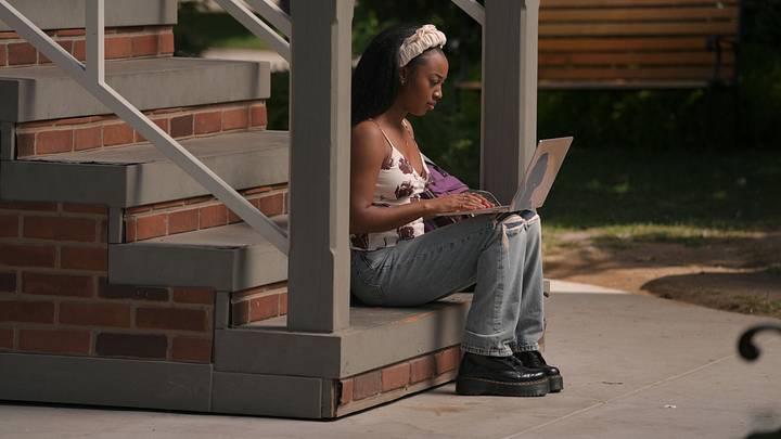 All American -- “Rebel Without a Pause” -- Image Number: ALA806_00213 -- Pictured: Alexis Chikaeze as Amina. Photo: Kevin Estrada/The CW -- © 2026 The CW Network, LLC. All Rights Reserved. All American -- “Rebel Without a Pause” -- Image Number: ALA806_00213 -- Pictured: Alexis Chikaeze as Amina. Photo: Kevin Estrada/The CW -- © 2026 The CW Network, LLC. All Rights Reserved.