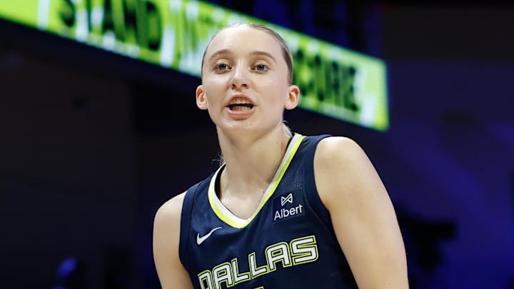 Aug 22, 2025; Arlington, Texas, USA;  Dallas Wings guard Paige Bueckers (5) reacts against the Seattle Storm during the second half at College Park Center. Mandatory Credit: Chris Jones-Imagn Images