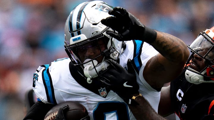 Carolina Panthers tight end Ja'Tavion Sanders (0) is tackled by Cincinnati Bengals linebacker Germaine Pratt (57) in the second quarter of the NFL game at Bank of America Stadium in Charlotte, N.C., on Sunday, Sept. 29, 2024. Carolina Panthers tight end Ja'Tavion Sanders (0) is tackled by Cincinnati Bengals linebacker Germaine Pratt (57) in the second quarter of the NFL game at Bank of America Stadium in Charlotte, N.C., on Sunday, Sept. 29, 2024.