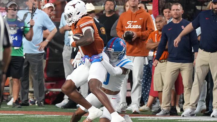 Texas Longhorns wide receiver Kaliq Lockett (7) is tackled by Mississippi Rebels cornerback Jalyn Crawford. Mandatory Credit: Scott Wachter-Imagn Images Texas Longhorns wide receiver Kaliq Lockett (7) is tackled by Mississippi Rebels cornerback Jalyn Crawford. Mandatory Credit: Scott Wachter-Imagn Images