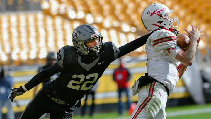 Fort Cherry's Matt Sieg intercepts a pass in front of South Side's Andrew Corfield