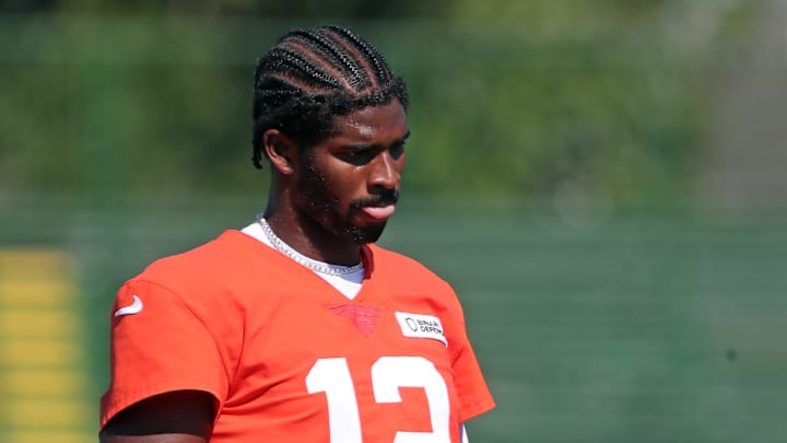 Cleveland Browns quarterback Shedeur Sanders (12) heads back to the sideline during NFL training camp practice at the Cleveland Browns training facility, Wednesday, July 23, 2025, in Berea, Ohio.