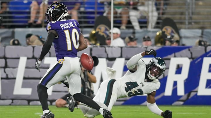Cornerback Mekhi Garner strips the ball from Baltimore Ravens wide receiver James Proche II  on a punt return.