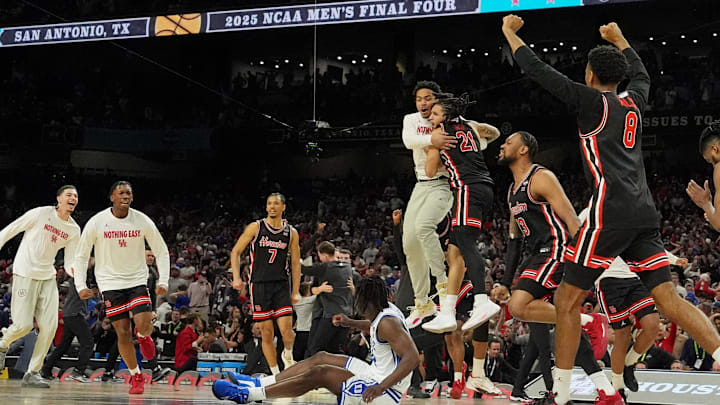 Apr 5, 2025; San Antonio, TX, USA; The Houston Cougars celebrates after their win against the Duke Blue Devils in a semifinal of the men's Final Four of the 2025 NCAA Tournament at the Alamodome. Mandatory Credit: Bob Donnan-Imagn Images