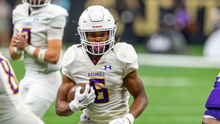 Jt Lindsey 6 runs the ball as Alexandria takes on Edna Karr in the LHSAA Div I State Football Championship game in the Caesars Superdome in New Orleans, LA. Saturday, Dec. 14, 2024.