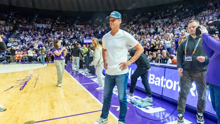 LSU Football Coach Lane Kiffin walks out with Tigers Basketball Coach Kim Mulkey, LSU Tigers Womens Basketball takes on the Kentucky Wildcats. Thursday, Jan. 1, 2026.