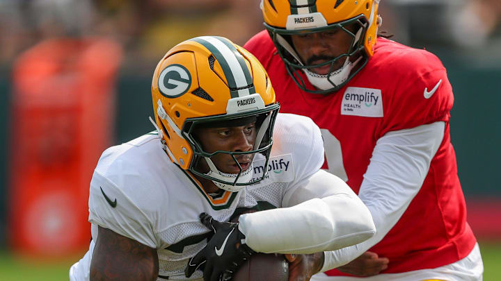 Green Bay Packers running back MarShawn Lloyd (32) takes a handoff in a drill during practice on Tuesday, August 12, 2025, at Ray Nitschke Field in Ashwaubenon, Wis.
Tork Mason/USA TODAY NETWORK-Wisconsin Green Bay Packers running back MarShawn Lloyd (32) takes a handoff in a drill during practice on Tuesday, August 12, 2025, at Ray Nitschke Field in Ashwaubenon, Wis.
Tork Mason/USA TODAY NETWORK-Wisconsin