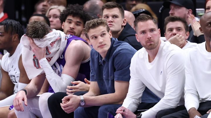 Mar 2, 2025; Salt Lake City, Utah, USA; Utah Jazz forward Lauri Markkanen (center) looks on from the bench during the second half of the game against the New Orleans Pelicans at Delta Center. Mandatory Credit: Rob Gray-Imagn Images
