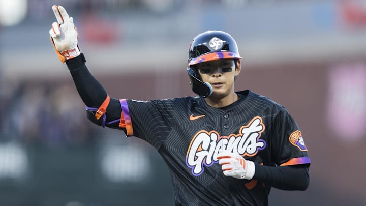 May 13, 2025; San Francisco, California, USA; San Francisco Giants center fielder Jung Hoo Lee (51) gestures after he hit a single against the Arizona Diamondbacks during the third inning at Oracle Park. May 13, 2025; San Francisco, California, USA; San Francisco Giants center fielder Jung Hoo Lee (51) gestures after he hit a single against the Arizona Diamondbacks during the third inning at Oracle Park.