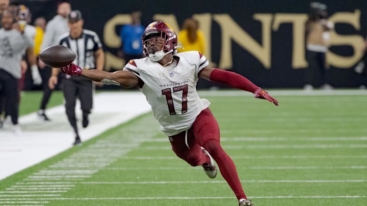 Dec 15, 2024; New Orleans, Louisiana, USA; Washington Commanders wide receiver Terry McLaurin (17) misses a catch during the second half against the New Orleans Saints at Caesars Superdome. Mandatory Credit: Matthew Hinton-Imagn Images