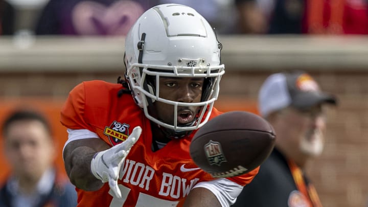Jan 28, 2025; Mobile, AL, USA; American team wide receiver Jalen Royals of Utah State (17) tracks down a pass during Senior Bowl practice for the American team at Hancock Whitney Stadium. Mandatory Credit: Vasha Hunt-Imagn Images