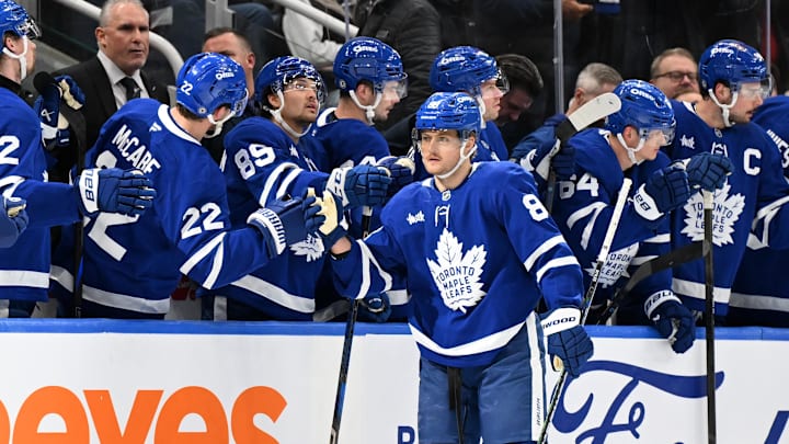 Mar 25, 2025; Toronto, Ontario, CAN;  Toronto Maple Leafs forward William Nylander (88) celebrates with teammates at the bench after scoring a goal against the Philadelphia Flyers in the second period at Scotiabank Arena. Mandatory Credit: Dan Hamilton-Imagn Images