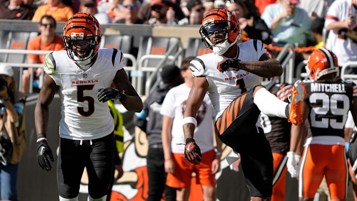 Cincinnati Bengals wide receiver Tee Higgins (5) and Bengals wide receiver Ja'Marr Chase (1) celebrate Chase touchdown in the 3rd quarter over the Cleveland Browns in the NFL Week 7 game at Huntington Bank Field in Cleveland October 20, 2024. The Bengals won 21-14..
