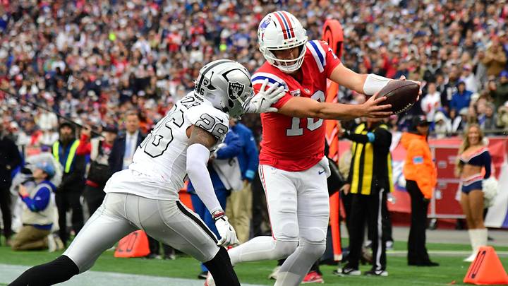 Oct 11, 2026; Foxborough, Massachusetts, USA; New England Patriots quarterback Drake Maye (10) runs for a three-yard touchdown against Las Vegas Raiders cornerback Darien Porter (26) during the third quarter at Gillette Stadium. Mandatory Credit: Bob DeChiara-Imagn Images Oct 11, 2026; Foxborough, Massachusetts, USA; New England Patriots quarterback Drake Maye (10) runs for a three-yard touchdown against Las Vegas Raiders cornerback Darien Porter (26) during the third quarter at Gillette Stadium. Mandatory Credit: Bob DeChiara-Imagn Images