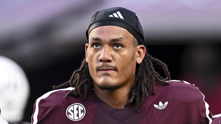 Oct 11, 2025; College Station, Texas, USA; Texas A&M Aggies defensive end T.J. Searcy (18) looks on prior to the game against the Florida Gators at Kyle Field. Oct 11, 2025; College Station, Texas, USA; Texas A&M Aggies defensive end T.J. Searcy (18) looks on prior to the game against the Florida Gators at Kyle Field.