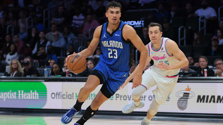 Jan 27, 2025; Miami, Florida, USA; Orlando Magic forward Tristan da Silva (23) drives to the basket past Miami Heat forward Duncan Robinson (55) during double overtime at Kaseya Center. Mandatory Credit: Sam Navarro-Imagn Images Jan 27, 2025; Miami, Florida, USA; Orlando Magic forward Tristan da Silva (23) drives to the basket past Miami Heat forward Duncan Robinson (55) during double overtime at Kaseya Center. Mandatory Credit: Sam Navarro-Imagn Images