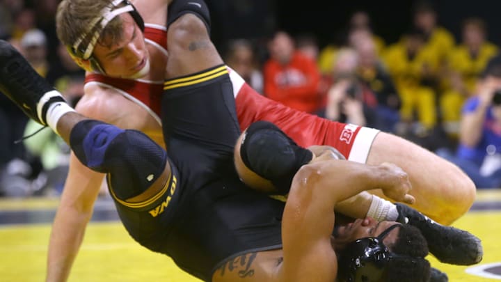 Iowa's Gabe Arnold wrestles Wisconsin's Shane Liegel in the 184-pound match on Sunday, Feb. 18, 2024, at Carver-Hawkeye Arena in Iowa City, Iowa. Iowa's Gabe Arnold wrestles Wisconsin's Shane Liegel in the 184-pound match on Sunday, Feb. 18, 2024, at Carver-Hawkeye Arena in Iowa City, Iowa.