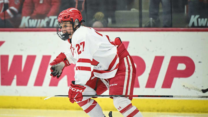 Wisconsin Badgers left wing Kirsten Simms (27) celebrates her goal early in the first period of a WCHA first-round game Saturday, March 1, 2025, at LaBahn Arena in Madison, Wisconsin. Wisconsin Badgers left wing Kirsten Simms (27) celebrates her goal early in the first period of a WCHA first-round game Saturday, March 1, 2025, at LaBahn Arena in Madison, Wisconsin.