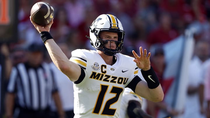 Oct 26, 2024; Tuscaloosa, Alabama, USA;  Missouri Tigers quarterback Brady Cook (12) throws a pass during the first half against the Alabama Crimson Tide at Bryant-Denny Stadium. Mandatory Credit: Butch Dill-Imagn Images