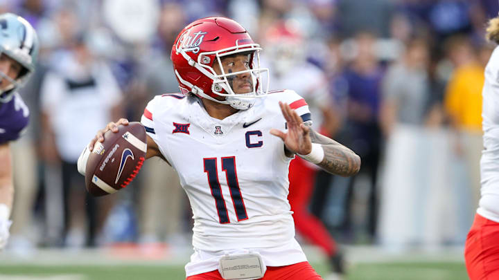 Sep 13, 2024; Manhattan, Kansas, USA; Arizona Wildcats quarterback Noah Fifita (11) drops back to pass during the first quarter against the Kansas State Wildcats at Bill Snyder Family Football Stadium. Mandatory Credit: Scott Sewell-Imagn Images