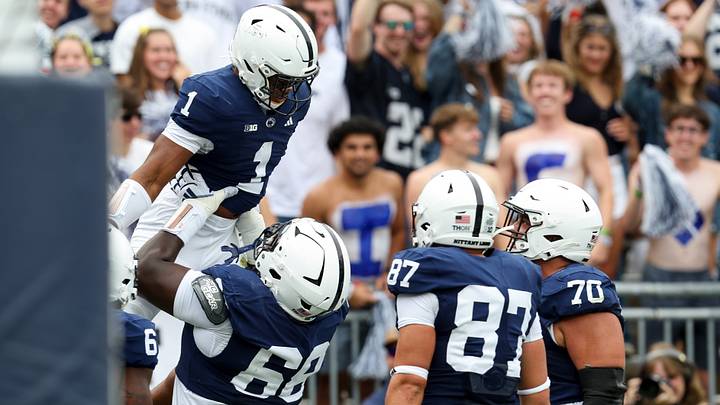 Penn State Nittany Lions running back James Peoples (1) celebrates with offensive lineman Anthony Donkoh (68) after scoring a touchdown against the Buffalo Bulls at Beaver Stadium. Penn State Nittany Lions running back James Peoples (1) celebrates with offensive lineman Anthony Donkoh (68) after scoring a touchdown against the Buffalo Bulls at Beaver Stadium.