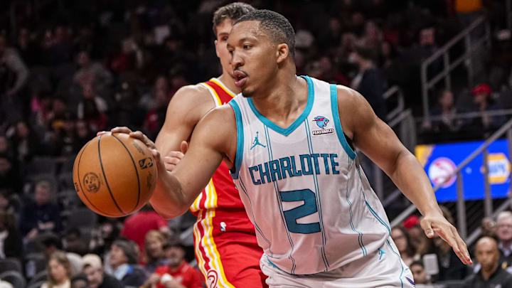Apr 10, 2024; Atlanta, Georgia, USA; Charlotte Hornets forward Grant Williams (2) controls the ball
