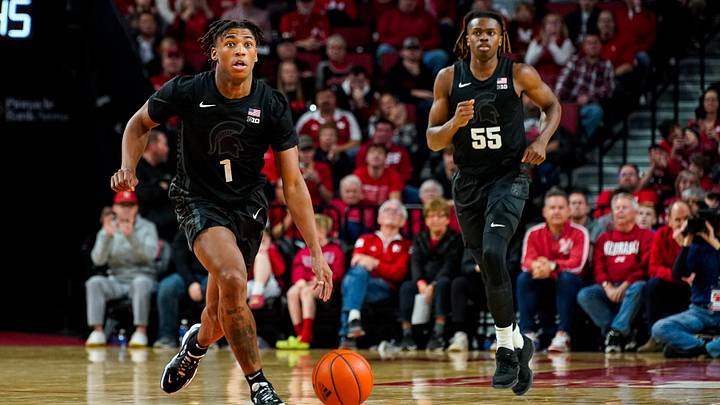 Dec 10, 2023; Lincoln, Nebraska, USA; Michigan State Spartans guard Jeremy Fears Jr. (1) and forward Coen Carr (55) during the second half against the Nebraska Cornhuskers at Pinnacle Bank Arena. Mandatory Credit: Dylan Widger-Imagn Images