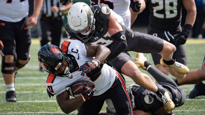 Oregon Ducks defensive back Dillon Thieneman brings down Oregon State Beavers running back Anthony Hankerson as the Oregon Ducks host the Oregon State Beavers Sept. 20, 2025, at Autzen Stadium in Eugene, Oregon.