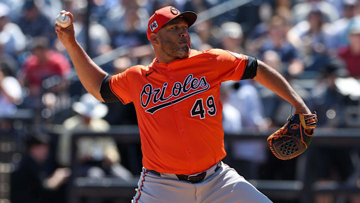 Mar 11, 2025; Tampa, Florida, USA; Baltimore Orioles pitcher Albert Suarez (49) throws a pitch against the New York Yankees in the second inning during spring training at George M. Steinbrenner Field. Mar 11, 2025; Tampa, Florida, USA; Baltimore Orioles pitcher Albert Suarez (49) throws a pitch against the New York Yankees in the second inning during spring training at George M. Steinbrenner Field.
