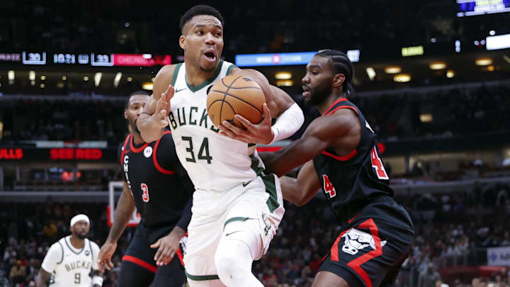 Chicago Bulls forward Patrick Williams (44) defends against Giannis Antetokounmpo.