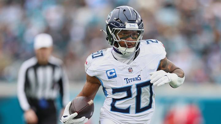 Jan 4, 2026; Jacksonville, Florida, USA; Tennessee Titans running back Tony Pollard (20) runs the ball against the Jacksonville Jaguars during the first quarter at EverBank Stadium. Mandatory Credit: Morgan Tencza-Imagn Images Jan 4, 2026; Jacksonville, Florida, USA; Tennessee Titans running back Tony Pollard (20) runs the ball against the Jacksonville Jaguars during the first quarter at EverBank Stadium. Mandatory Credit: Morgan Tencza-Imagn Images