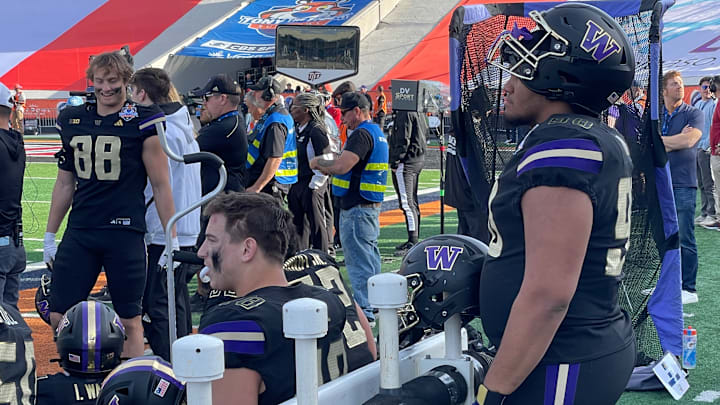 Omar Khan watches the Sun Bowl from the Husky sideline. Omar Khan watches the Sun Bowl from the Husky sideline.
