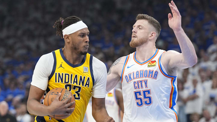 Jun 16, 2025; Oklahoma City, Oklahoma, USA; Indiana Pacers center Myles Turner (33) drives to the basket against Oklahoma City Thunder center Isaiah Hartenstein (55) during the second quarter of game five of the 2025 NBA Finals at Paycom Center. Mandatory Credit: Kyle Terada-Imagn Images Jun 16, 2025; Oklahoma City, Oklahoma, USA; Indiana Pacers center Myles Turner (33) drives to the basket against Oklahoma City Thunder center Isaiah Hartenstein (55) during the second quarter of game five of the 2025 NBA Finals at Paycom Center. Mandatory Credit: Kyle Terada-Imagn Images