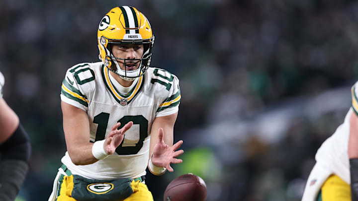 Green Bay Packers quarterback Jordan Love (10) drops back to pass against the Philadelphia Eagles during the third quarter in an NFC wild card game at Lincoln Financial Field. 