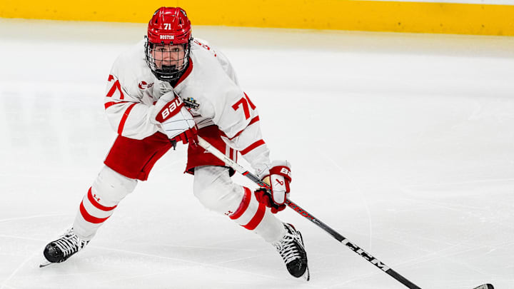 Apr 11, 2024; Saint Paul, Minnesota, USA; Boston U. forward Macklin Celebrini (71) carries the puck
