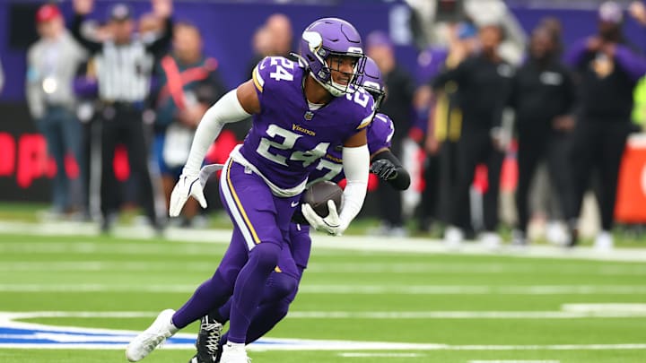 Oct 6, 2024; Tottenham, ENG; Minnesota Vikings Defensive Back Camryn Bynum (24) celebrates an interception in the 1st Quarter against New York Jets at Tottenham Hotspur Stadium.
