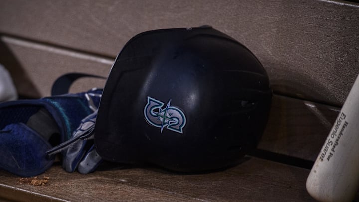 Jun 5, 2022; Arlington, Texas, USA; A view of a Seattle Mariners batting helmet and logo during the game between the Texas Rangers and the Seattle Mariners at Globe Life Field. Mandatory Credit: Jerome Miron-Imagn Images
