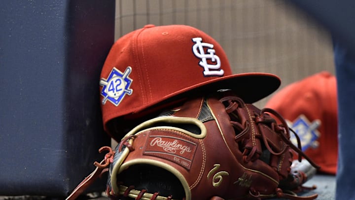 Apr 15, 2019; Milwaukee, WI, USA; A cap rests on the dug out wall with the number 42 on the hat in honor of Major League Baseball s Jackie Robinson Day. Mandatory Credit: Michael McLoone-Imagn Images Apr 15, 2019; Milwaukee, WI, USA; A cap rests on the dug out wall with the number 42 on the hat in honor of Major League Baseball s Jackie Robinson Day. Mandatory Credit: Michael McLoone-Imagn Images