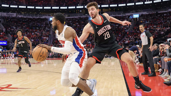 Jan 20, 2025; Houston, Texas, USA;  Detroit Pistons guard Malik Beasley (5) dribbles past Houston Rockets center Alperen Sengun (28) in the second half at Toyota Center. Mandatory Credit: Thomas Shea-Imagn Images
