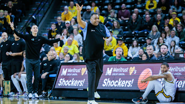 Feb 23, 2025; Wichita, Kansas, USA; Tulane Green Wave Ron Hunter reacts to play during the first half against the Wichita State Shockers at Charles Koch Arena.