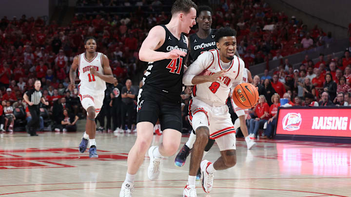 Mylik Wilson of Houston (with ball) Mylik Wilson of Houston (with ball)