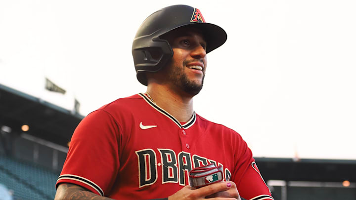 Jul 11, 2022; San Francisco, California, USA; Arizona Diamondbacks left fielder David Peralta (6) smiles after scoring a run against the San Francisco Giants during the third inning at Oracle Park. Mandatory Credit: Kelley L Cox-Imagn Images