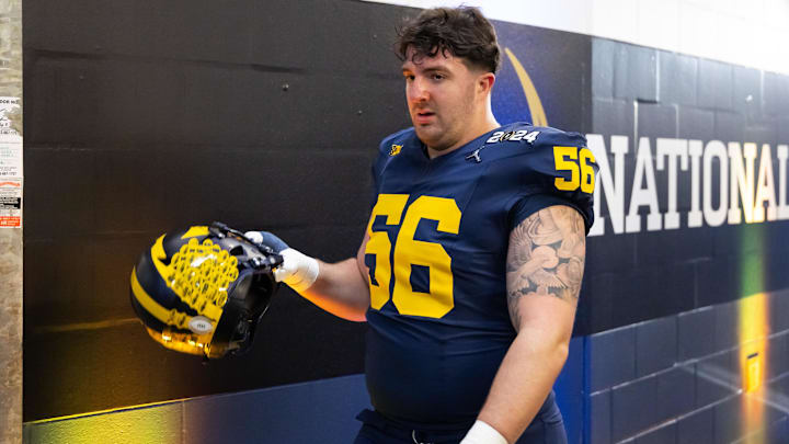 Jan 8, 2024; Houston, TX, USA; Michigan Wolverines offensive lineman Dominick Giudice (56) against the Washington Huskies during the 2024 College Football Playoff national championship game at NRG Stadium. Mandatory Credit: Mark J. Rebilas-Imagn Images