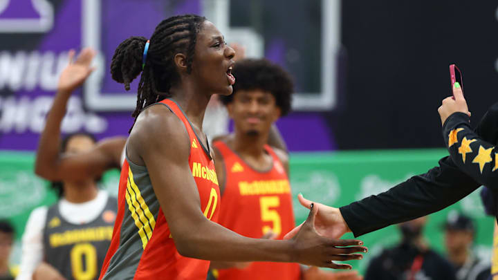 Mar 30, 2026; Goodyear, AZ, USA; Oliviyah Edwards celebrates after dunking the ball during the McDonalds All American Jam Fest at Millennium High School. Mandatory Credit: Mark J. Rebilas-Imagn Images